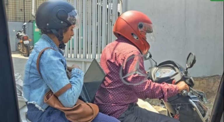 ಟ್ರಾಫಿಕ್ ಜಾಮ್; ಲ್ಯಾಪ್ಟಾಪ್ನಲ್ಲಿ ಕೆಲಸ ಮಾಡುತ್ತಿರುವ ಯುವತಿ bengaluru